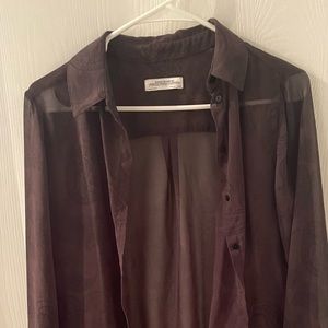 Long see-through blouse.